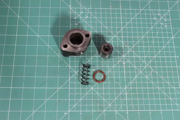 Корпус цилиндра КОМ (в сборе (втулка + пружина + корпус цилиндра )) SHAANXI