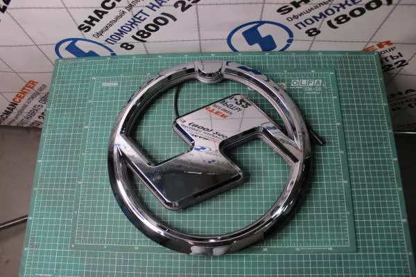 Эмблема (Серый, Металл, с белой подсветской) SHAANXI, X5000