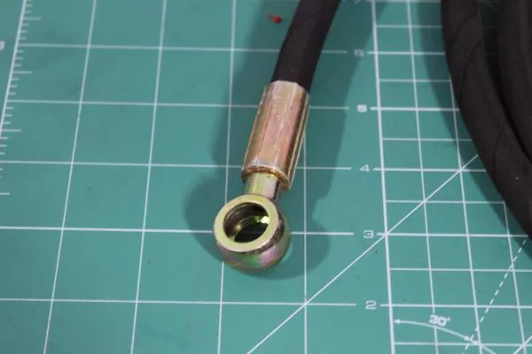 Шланг сцепления ПГУ L3 600, (ухо-гайка) SITRAK, A7, T5G.