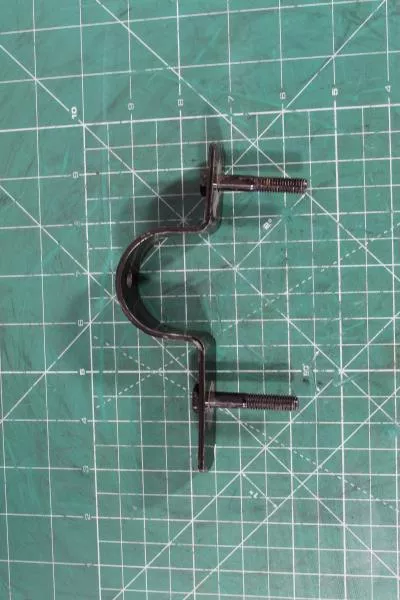 Кронштейн брызговика (Front, внешний, скоба) SHAANXI, X3000, (81.61243.5268)