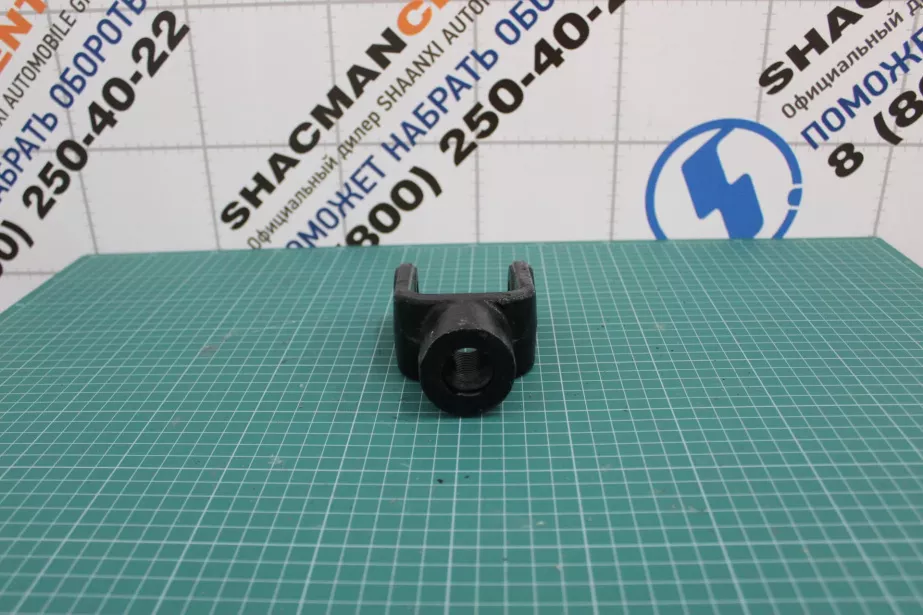 Кронштейн крепления амортизатора передней подвески (вилка, с фланцем) SHAANXI для грузовиков *