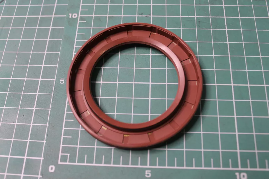 Сальник КОМ (Rear, PR70, 55*80*10) HOWO для грузовиков *