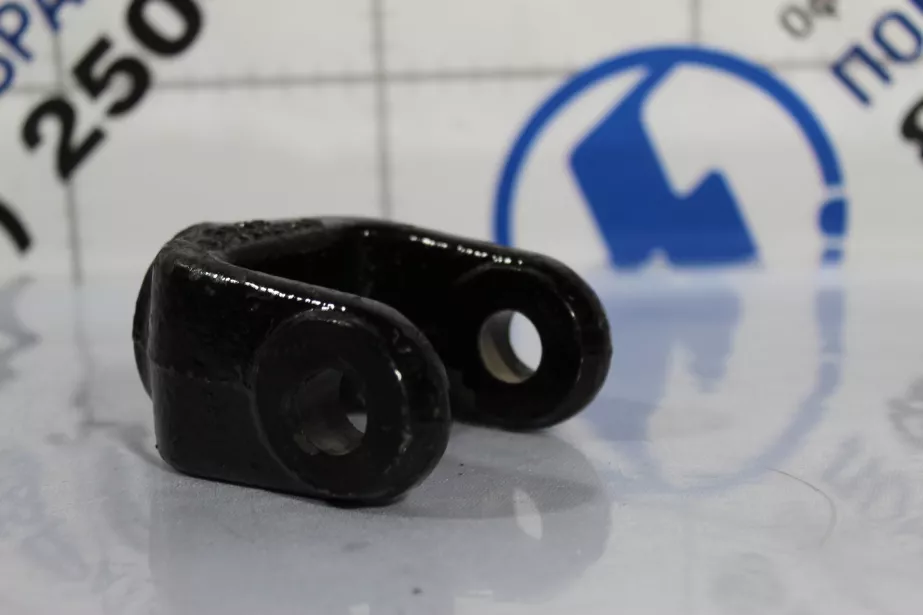 Кронштейн крепления амортизатора передней подвески (вилка) SHAANXI для грузовиков *