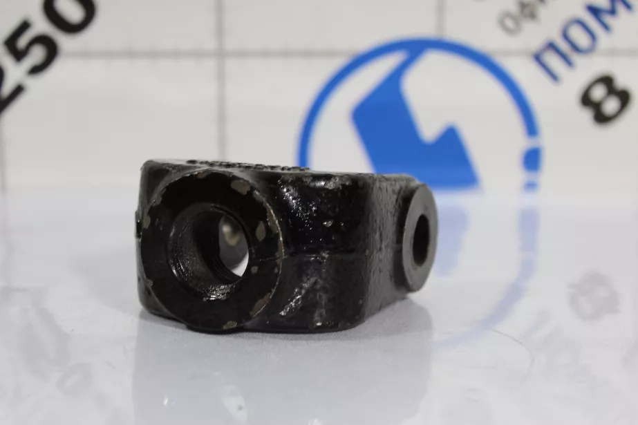 Кронштейн крепления амортизатора передней подвески (вилка) SHAANXI для грузовиков *