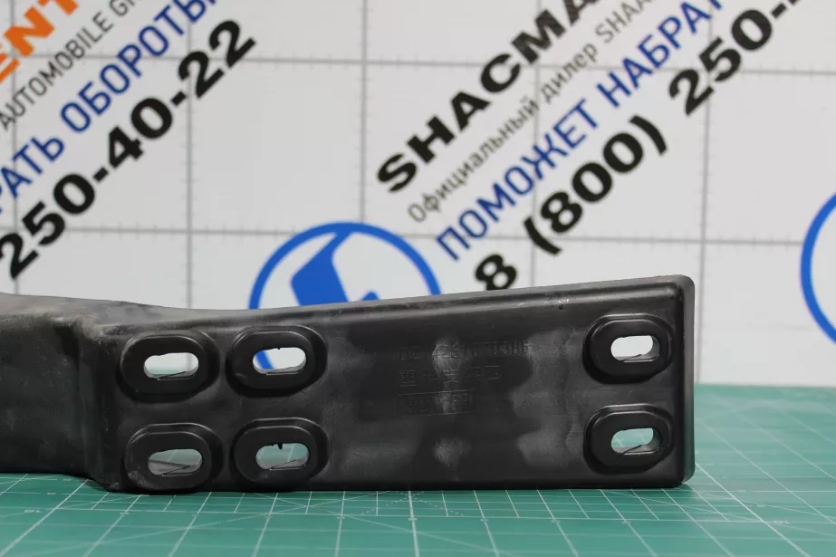 Кронштейн обтекателя кабины (L, нижний) SHAANXI, X5000 для грузовиков *