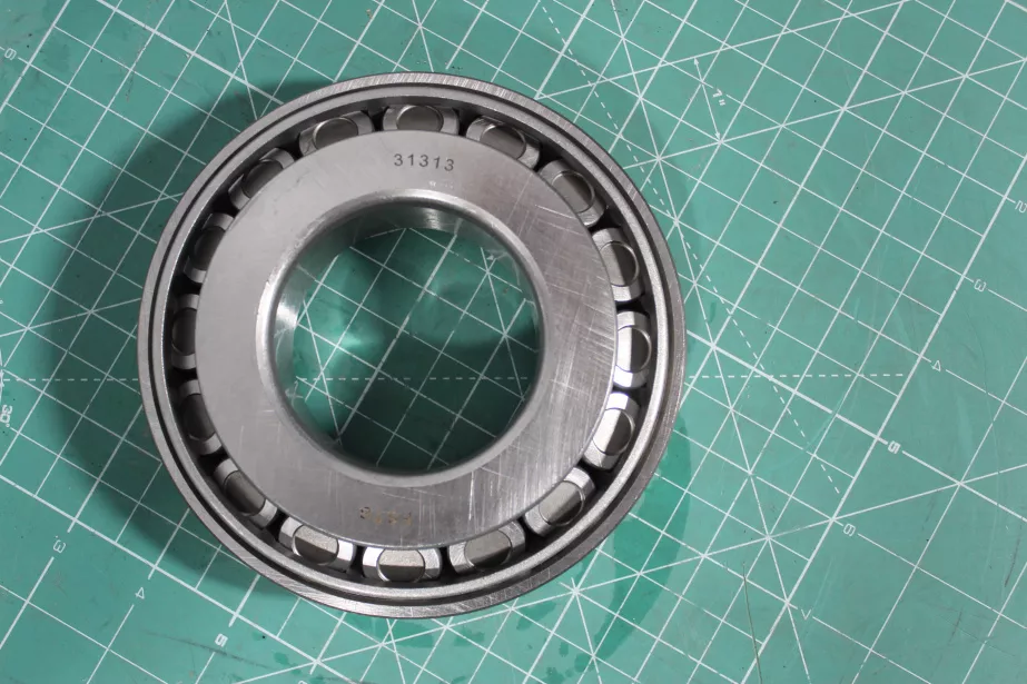 Подшипник редуктора среднего редуктора D140, H36, (31313) SHAANXI, (WG9981031313/1) для грузовиков *