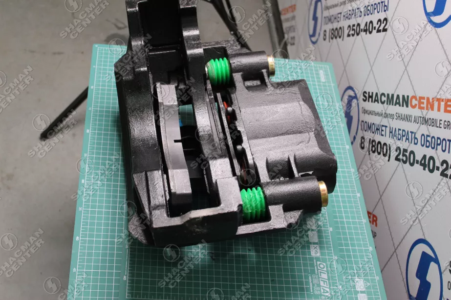 Суппорт тормозной (FR) SHAANXI, F3000 для грузовиков *