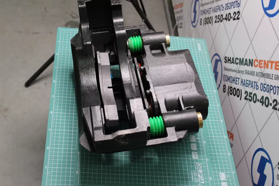 Суппорт тормозной (FR) SHAANXI, F3000 для грузовиков *