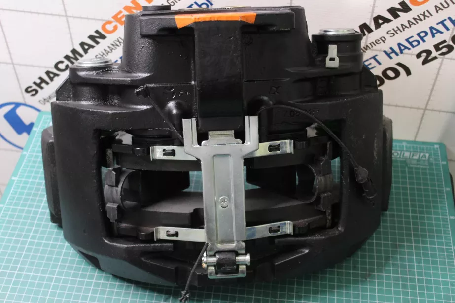 Суппорт тормозной (RL) SHAANXI, X6000 для грузовиков *