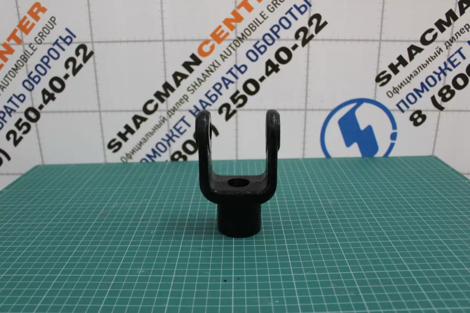 Кронштейн крепления амортизатора передней подвески (вилка, с фланцем) SHAANXI для грузовиков *