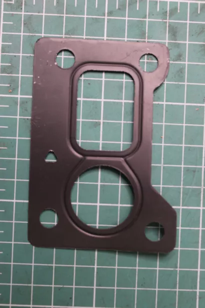 Прокладка кронштейна масляных фильтров SHAANXI, WP12 для грузовиков *