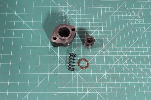 Корпус цилиндра КОМ (в сборе (втулка + пружина + корпус цилиндра )) SHAANXI