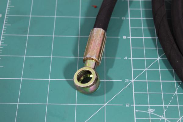 Шланг сцепления ПГУ L3 600, (ухо-гайка) SITRAK, A7, T5G.