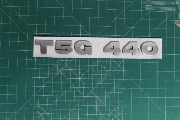 Эмблема (Серый, Пластик) SITRAK, T5G