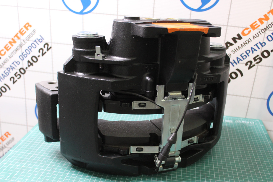 Суппорт тормозной (FR) SHAANXI, X6000 для грузовиков *