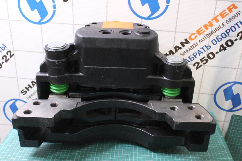 Суппорт тормозной (FL) SHAANXI, X6000 для грузовиков *